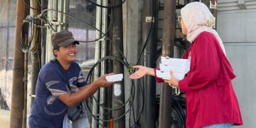 Berbagi Hari Jumat Berkah, BRI Bogor Pajajaran Bagikan Paket Makanan Bagi Warga